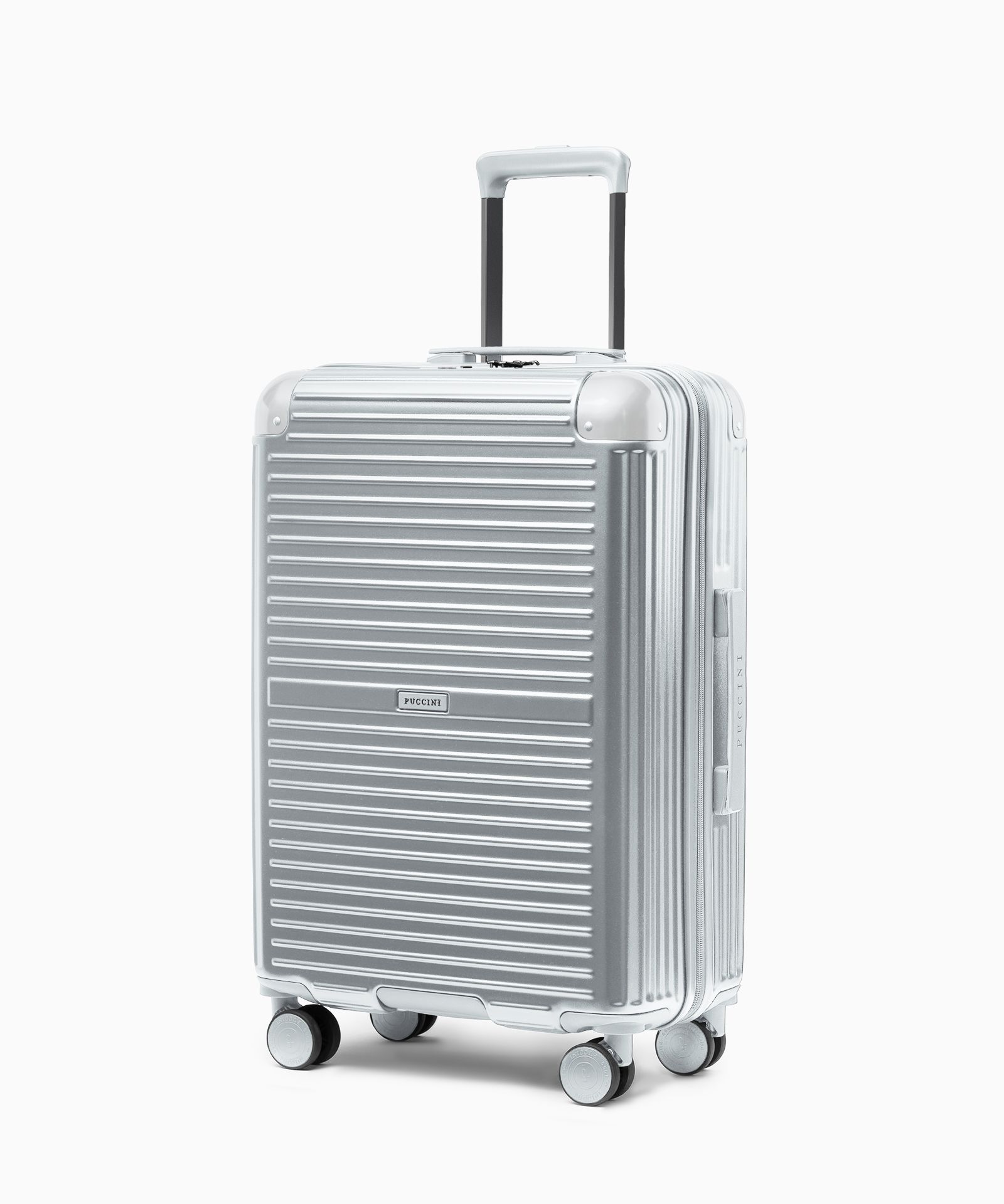 Közepes méretű bőrönd kerekeken, alumínium sarkokkal, ezüst színben