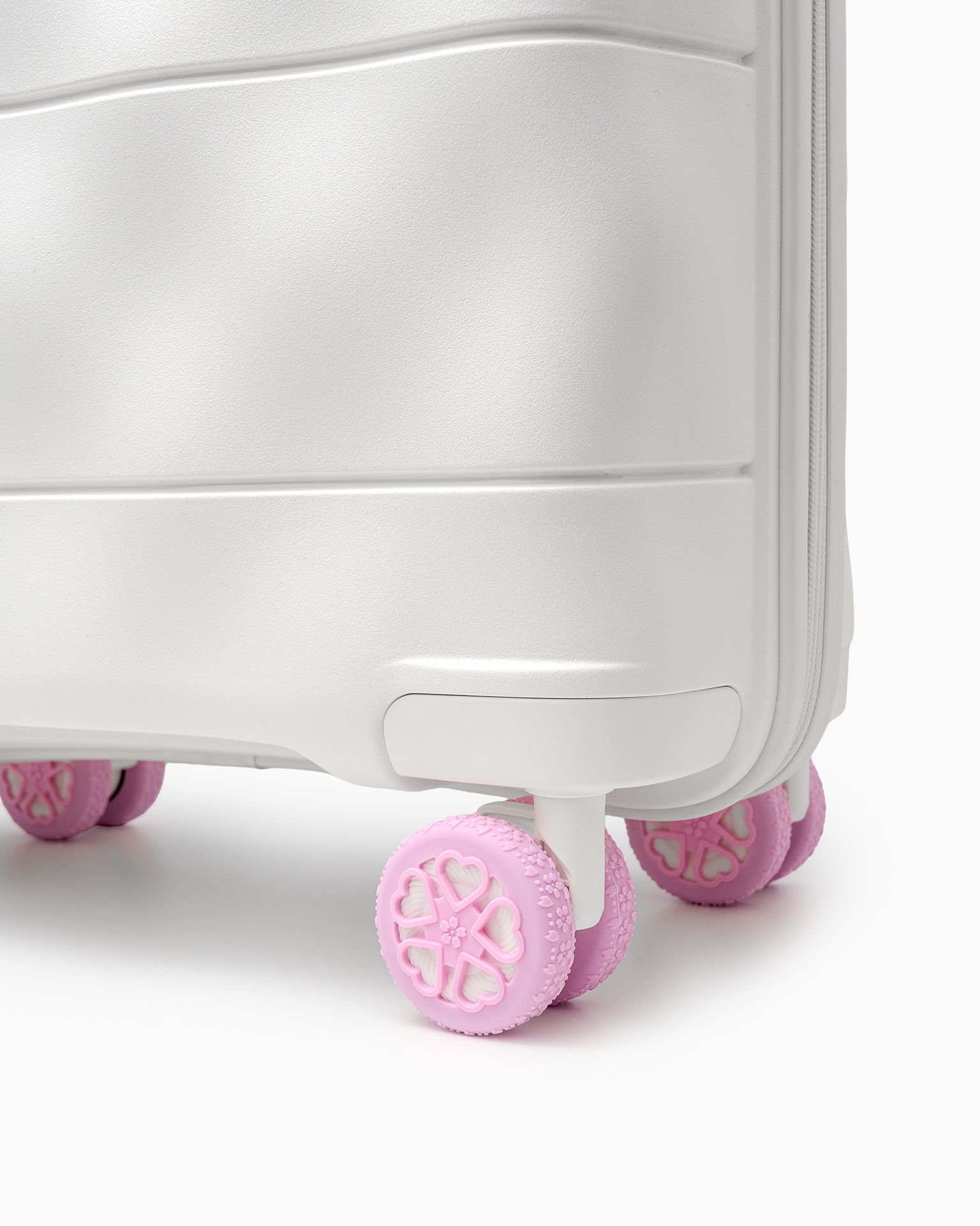 Rózsaszín bőröndkerék védő